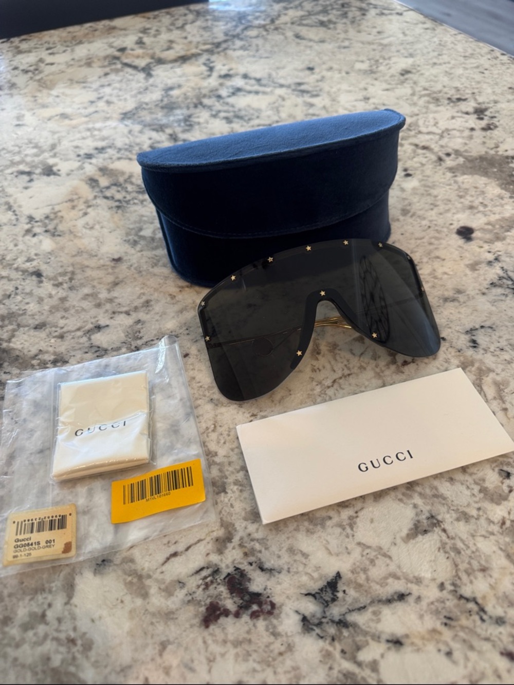 Gucci Black Shield Sunglasses with Gold Star Details